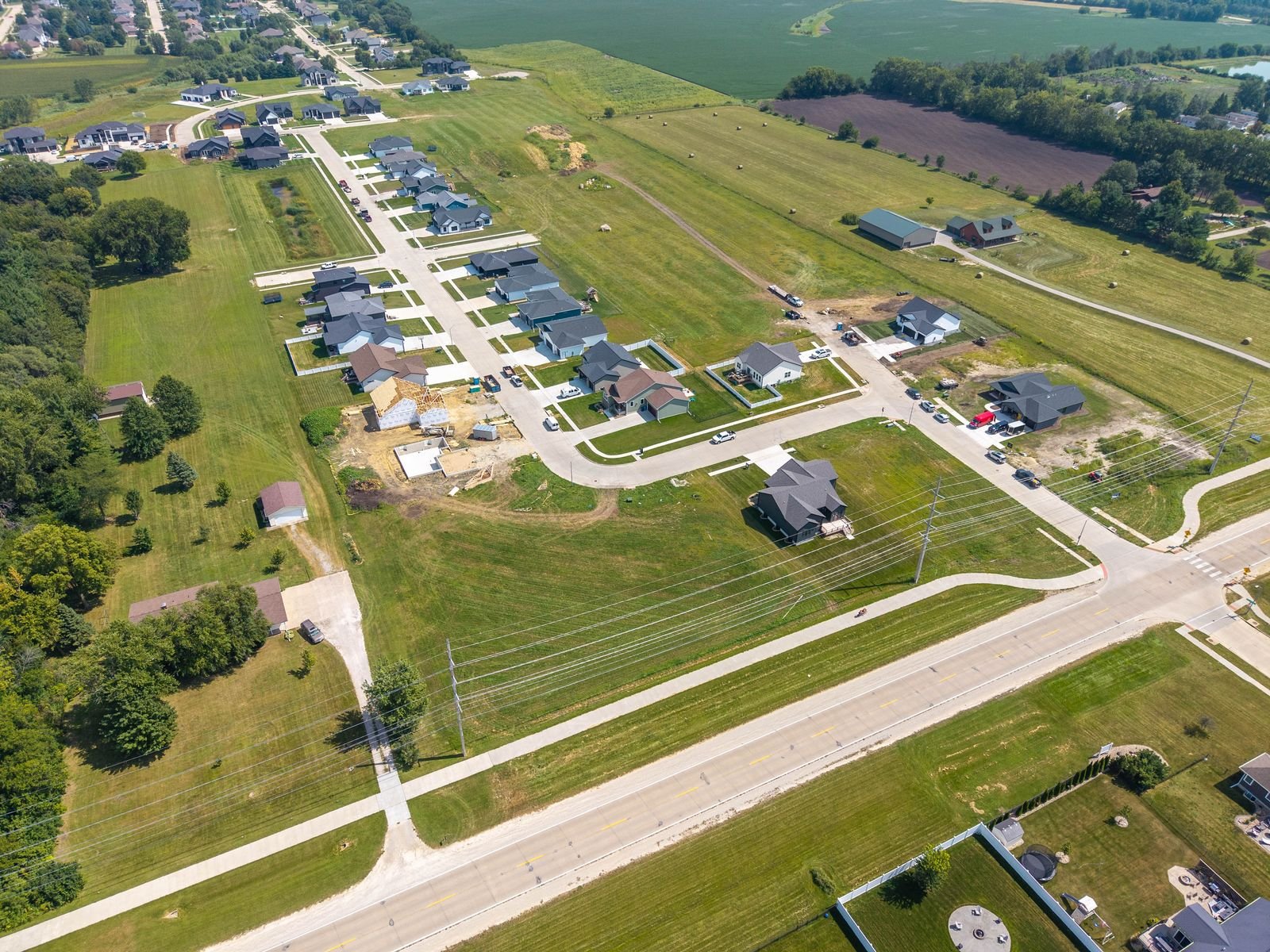 Aerial view of West Fork Crossing homes and open lots in Cedar Falls